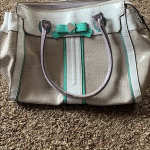 GUESS purple, mint green, white, and tan purse